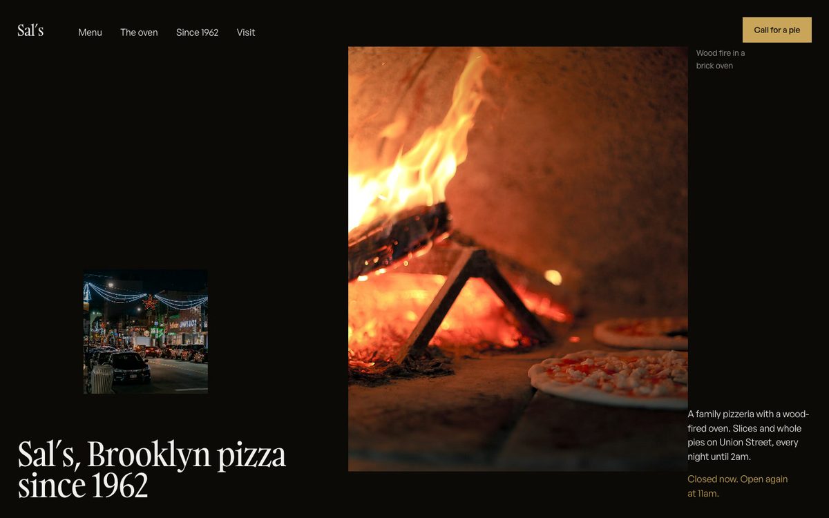 The pizza page Claude made with the three skills: a dark page with a real photo of a wood fire and pizzas